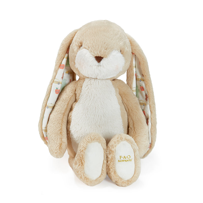 Plush bunny toy with patterned ears on a white background