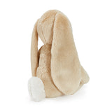 Beige plush toy with long ears on a white background