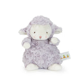 Plush toy sheep with a white face and purple body on a white background