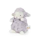 Plush toy sheep with a tag on a white background