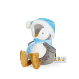 Plush penguin toy with a blue hat and scarf on a white background