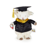 Stuffed animal toy in graduation attire with a cap and gown on a white background