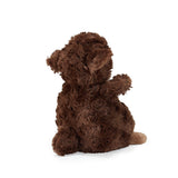Brown plush lamb sitting on a white background