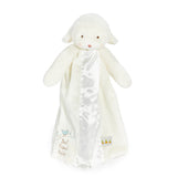 front view White plush lamb toy with a blanket on a white background