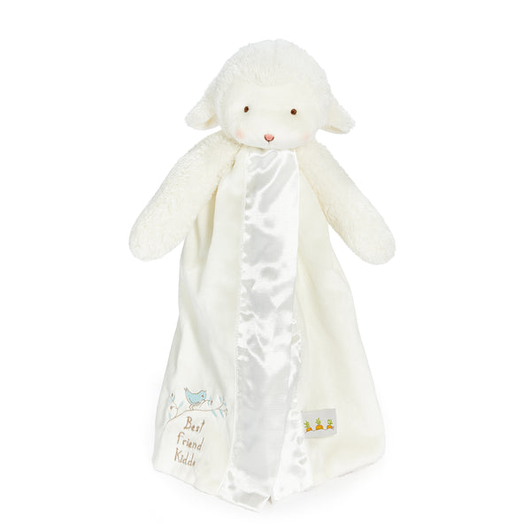 White plush lamb toy with a blanket on a white background