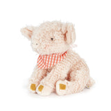 Plush pig toy with a red and white checkered bow tie on a white background