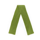 Flat lay of Green knitted scarf on a white background