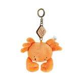 Orange crab keychain with wooden tag and metal chain.