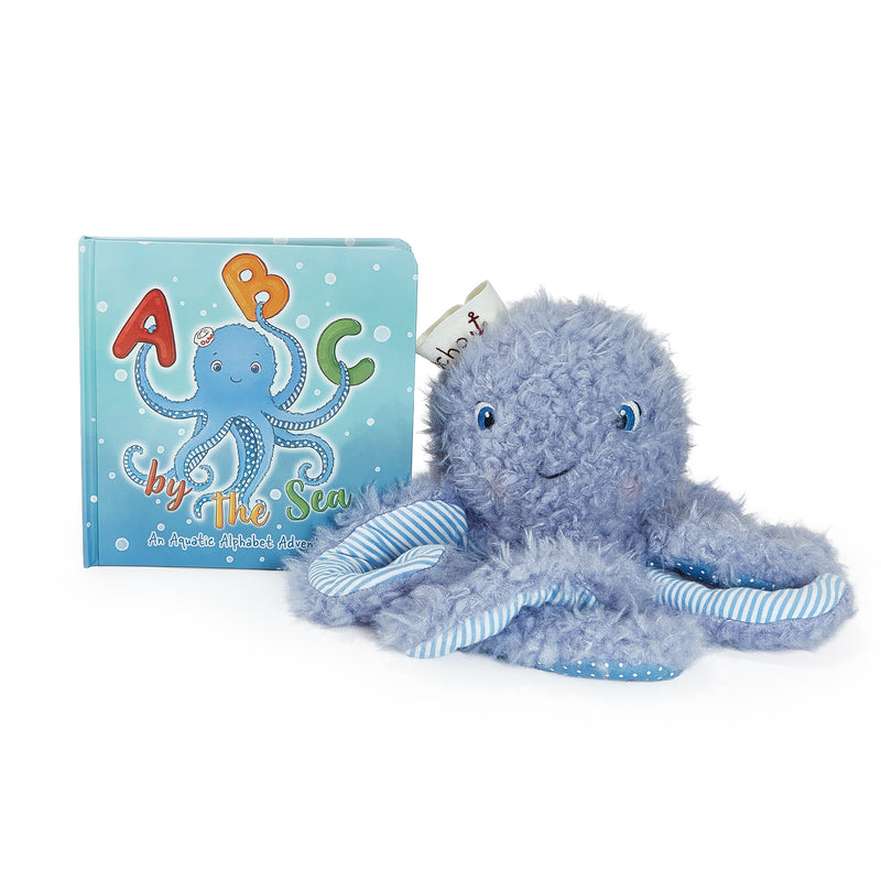 Plush octopus toy with a matching book titled 'A to Z by the Sea' on a white background
