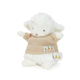 Plush lamb toy wearing a knitted sweater with carrot tags on a white background